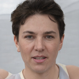 Joyful white adult female with short  brown hair and brown eyes