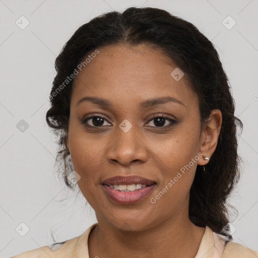 Joyful black young-adult female with medium  brown hair and brown eyes