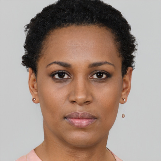 Neutral black young-adult female with short  brown hair and brown eyes