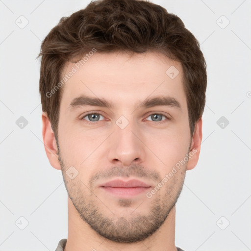 Neutral white young-adult male with short  brown hair and grey eyes