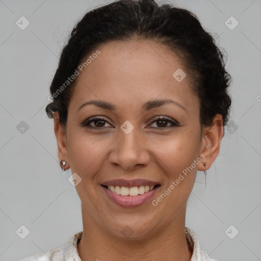 Joyful latino young-adult female with short  brown hair and brown eyes