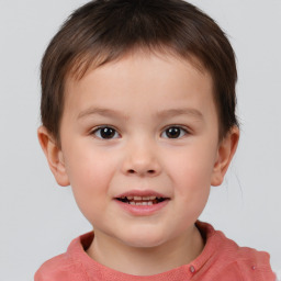 Joyful white child male with short  brown hair and brown eyes