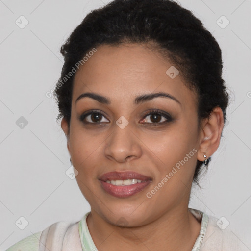 Joyful latino young-adult female with short  brown hair and brown eyes