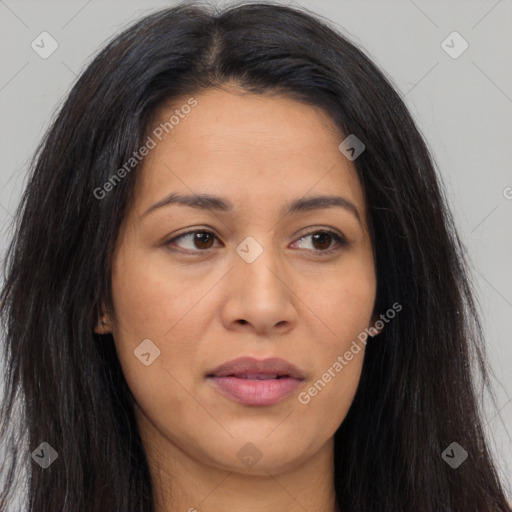 Joyful latino young-adult female with long  brown hair and brown eyes