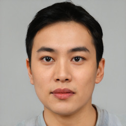 Neutral asian young-adult male with short  black hair and brown eyes