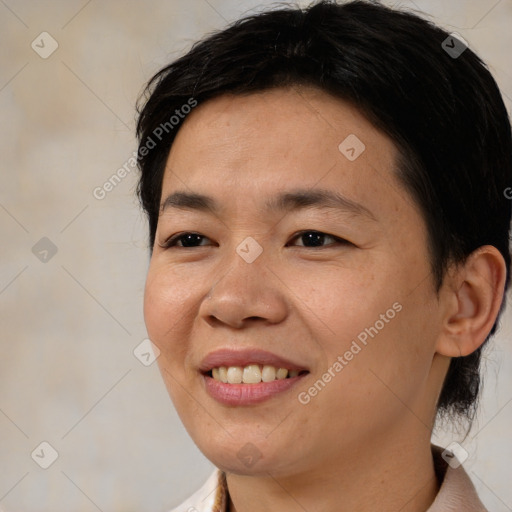 Joyful asian young-adult female with medium  brown hair and brown eyes