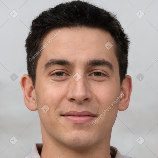 Joyful white young-adult male with short  brown hair and brown eyes