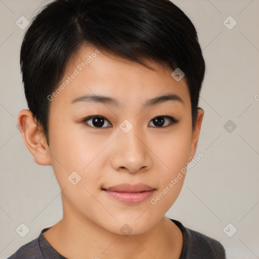 Joyful asian child female with short  brown hair and brown eyes