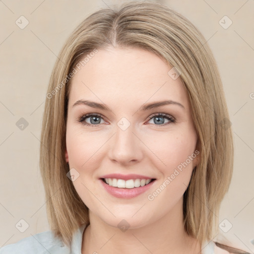 Joyful white young-adult female with medium  brown hair and green eyes