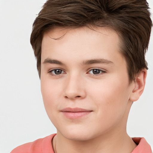 Joyful white child male with short  brown hair and brown eyes