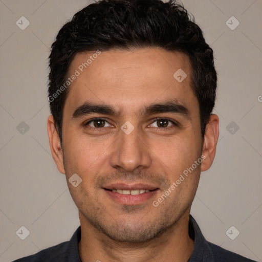 Joyful white young-adult male with short  black hair and brown eyes