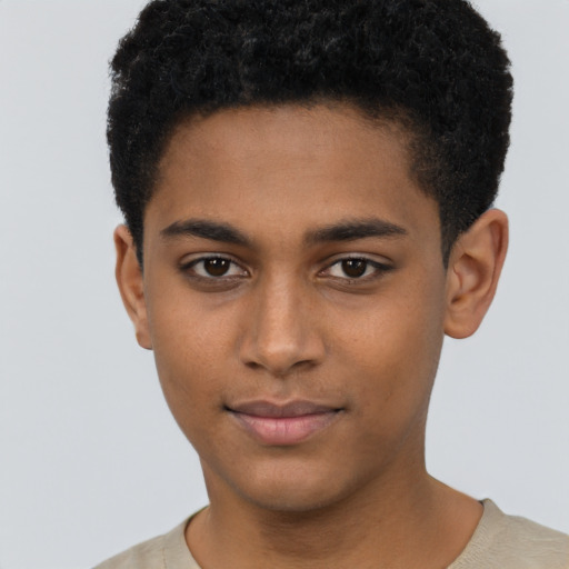 Joyful black young-adult male with short  brown hair and brown eyes