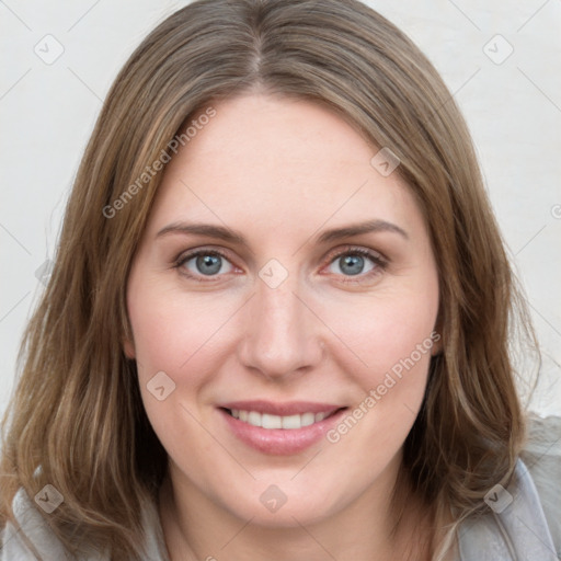 Joyful white young-adult female with medium  brown hair and blue eyes