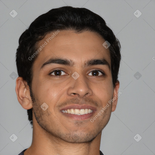 Joyful latino young-adult male with short  brown hair and brown eyes