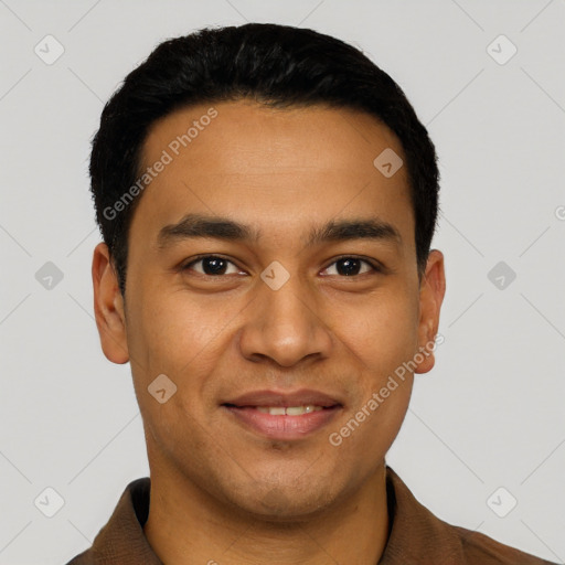 Joyful latino young-adult male with short  black hair and brown eyes