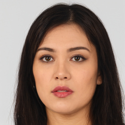 Neutral asian young-adult female with long  brown hair and brown eyes