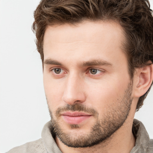 Neutral white young-adult male with short  brown hair and grey eyes