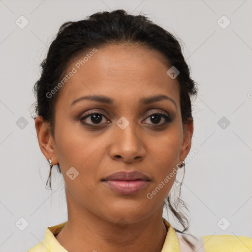 Joyful latino young-adult female with short  brown hair and brown eyes