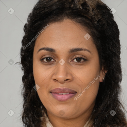 Joyful latino young-adult female with long  brown hair and brown eyes