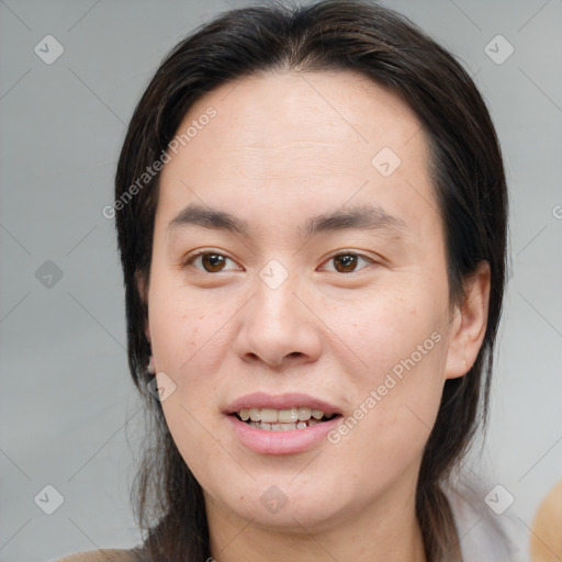 Joyful white young-adult female with medium  brown hair and brown eyes