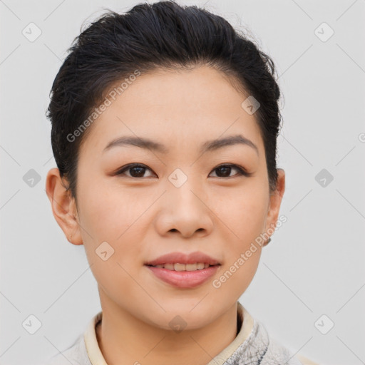 Joyful asian young-adult female with short  brown hair and brown eyes