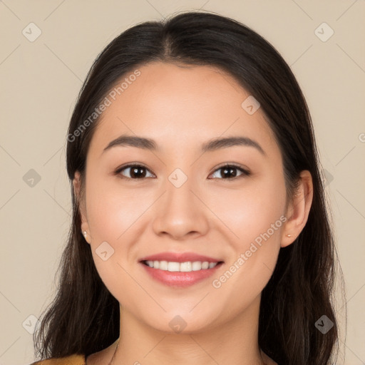 Joyful white young-adult female with long  brown hair and brown eyes