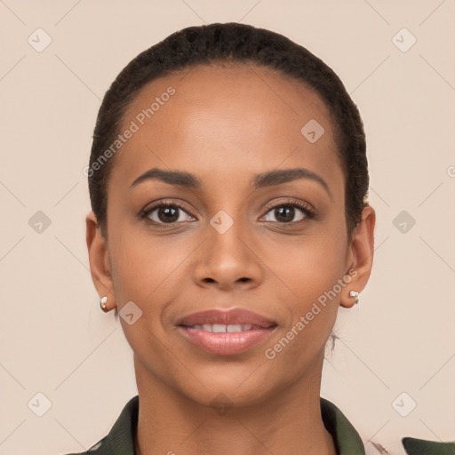 Joyful latino young-adult female with short  black hair and brown eyes