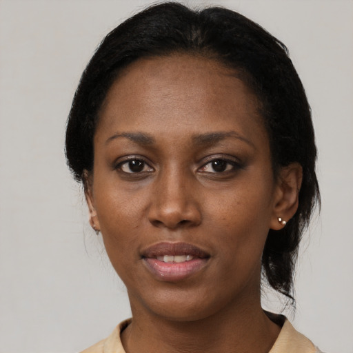 Neutral black young-adult female with medium  black hair and brown eyes