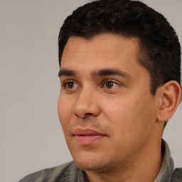 Neutral white young-adult male with short  black hair and brown eyes