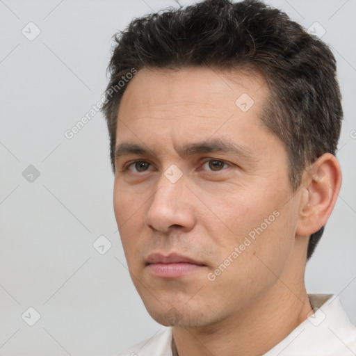 Neutral white adult male with short  brown hair and brown eyes