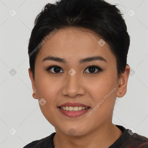 Joyful asian young-adult female with short  brown hair and brown eyes