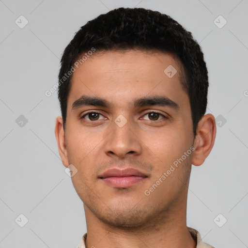 Neutral latino young-adult male with short  black hair and brown eyes