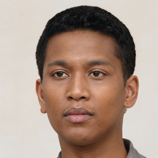 Neutral black young-adult male with short  black hair and brown eyes