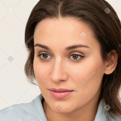 Neutral white young-adult female with medium  brown hair and brown eyes