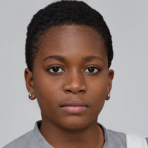 Neutral black child female with short  brown hair and brown eyes