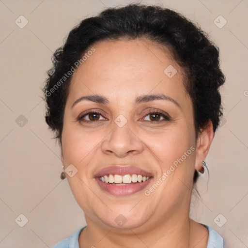 Joyful latino adult female with short  brown hair and brown eyes