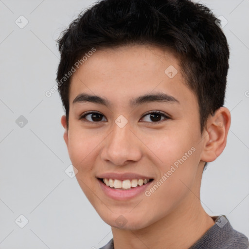 Joyful asian young-adult male with short  brown hair and brown eyes