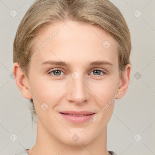 Joyful white young-adult female with short  brown hair and grey eyes