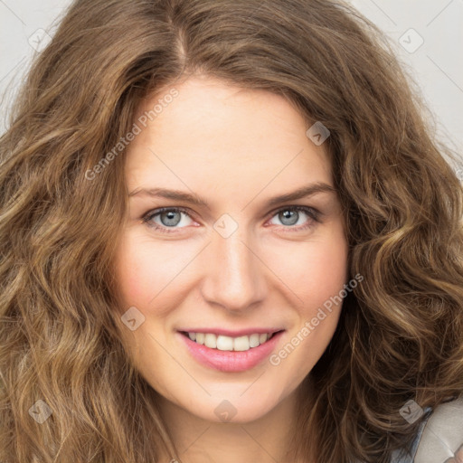 Joyful white young-adult female with long  brown hair and green eyes