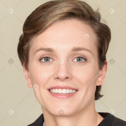 Joyful white young-adult female with short  brown hair and grey eyes