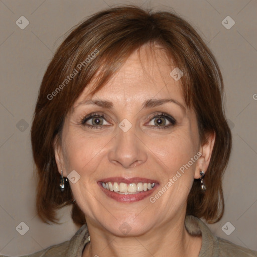 Joyful white adult female with medium  brown hair and brown eyes