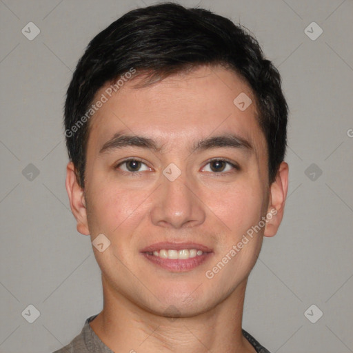 Joyful white young-adult male with short  black hair and brown eyes