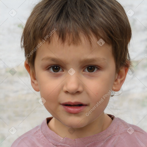 Joyful white child male with short  brown hair and brown eyes