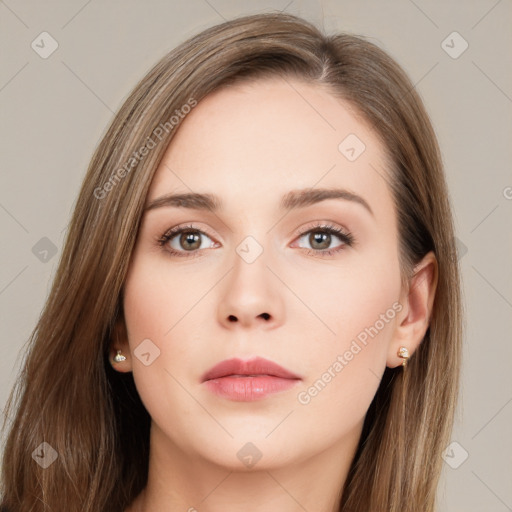 Neutral white young-adult female with long  brown hair and brown eyes