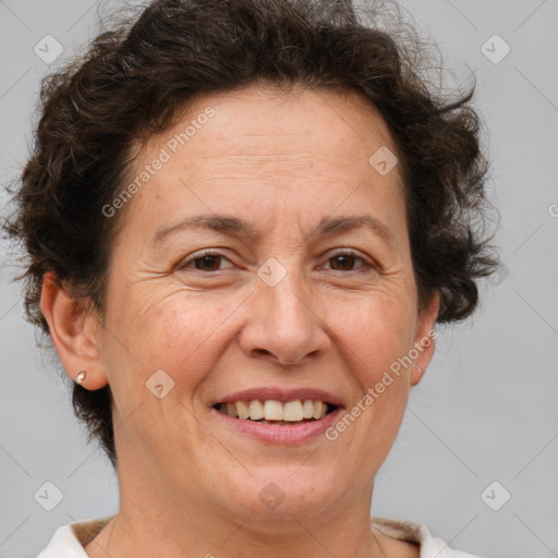 Joyful white adult female with short  brown hair and brown eyes