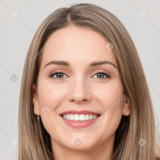 Joyful white young-adult female with long  brown hair and grey eyes