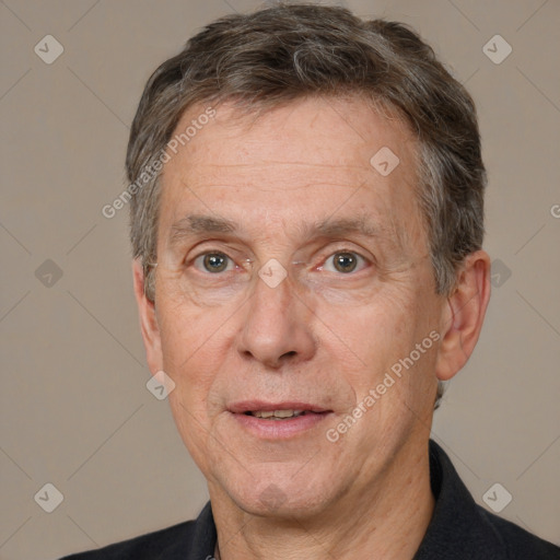 Joyful white middle-aged male with short  brown hair and brown eyes