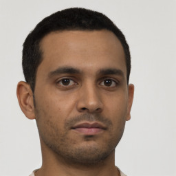 Neutral latino young-adult male with short  brown hair and brown eyes