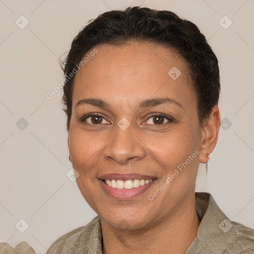 Joyful white adult female with short  brown hair and brown eyes