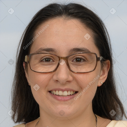 Joyful white adult female with medium  brown hair and brown eyes